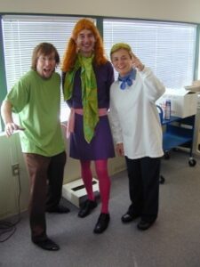 Shows the author dressed as Daphne, from Scooby-Doo.