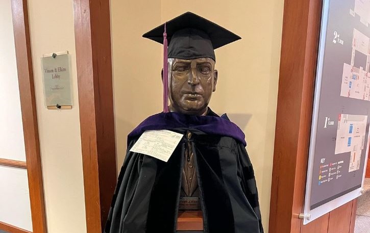 A bust of Arthur J. Morris dressed in graduation regalia